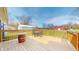 Lovely wooden back deck with a seating area and view of the expansive backyard at 7212 E Rocklane Rd, Needham, IN 46162