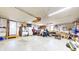 Spacious garage with ample storage space, work area, and utility sink at 7212 E Rocklane Rd, Needham, IN 46162
