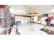 Spacious garage with ample storage space and work area at 7212 E Rocklane Rd, Needham, IN 46162