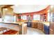 Rustic kitchen featuring custom wood countertops and stainless steel appliances at 7212 E Rocklane Rd, Needham, IN 46162