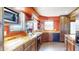 This beautiful kitchen offers butcher block countertops, stainless steel appliances, and abundant natural light at 7212 E Rocklane Rd, Needham, IN 46162