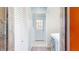 Functional laundry room features white walls, a utility closet, and a modern washer and dryer at 7212 E Rocklane Rd, Needham, IN 46162