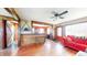 Cozy living area featuring wood accents and a view into a rustic kitchen at 7212 E Rocklane Rd, Needham, IN 46162