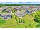 Overhead view showcasing homes with spacious backyards, mature trees, and well-maintained landscaping at 7251 Birch Leaf Dr, Indianapolis, IN 46259