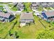 Aerial view capturing the large backyard, patio, and landscaping around the home at 7251 Birch Leaf Dr, Indianapolis, IN 46259