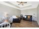 Well-lit living room features hardwood floors, comfortable seating and stylish decorative accents at 7251 Birch Leaf Dr, Indianapolis, IN 46259