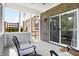 Relaxing screened-in porch featuring comfortable seating and brick accents at 7251 Birch Leaf Dr, Indianapolis, IN 46259