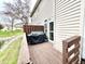 Outdoor deck with privacy fence and space for a grill and seating area at 8030 Windham Lake Way, Indianapolis, IN 46214