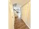 Entryway with wood flooring, storage closet and staircase leading to the upper level at 8030 Windham Lake Way, Indianapolis, IN 46214