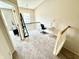 Bright upstairs loft area with carpeted floors, modern furnishings, and natural light at 8030 Windham Lake Way, Indianapolis, IN 46214