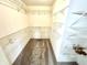 Walk-in closet with metal shelving at 8030 Windham Lake Way, Indianapolis, IN 46214