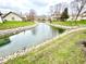 Scenic water view with lush greenery and community landscaping at 8030 Windham Lake Way, Indianapolis, IN 46214