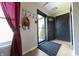Welcoming entryway with tiled floor and a convenient coat rack at 839 Bough St, Whiteland, IN 46184