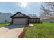 Charming single-story home with well-maintained lawn and attached garage at 839 Bough St, Whiteland, IN 46184