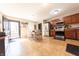 Eat-in kitchen with stainless appliances and a table with chairs at 839 Bough St, Whiteland, IN 46184