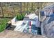 Backyard aerial featuring a multi-tiered deck, hot tub, and wooded surroundings at 8990 Pickwick Dr, Indianapolis, IN 46260
