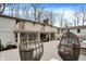 Spacious backyard with a nice deck and egg chairs perfect for relaxing and enjoying the view at 8990 Pickwick Dr, Indianapolis, IN 46260