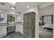 Bathroom featuring a vanity, sink, and decorative cabinet at 8990 Pickwick Dr, Indianapolis, IN 46260