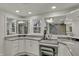 Bright bathroom with dual sinks, vanity area, and modern fixtures at 8990 Pickwick Dr, Indianapolis, IN 46260