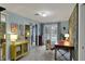 Bedroom featuring ample natural light, a desk, and mirrored closets at 8990 Pickwick Dr, Indianapolis, IN 46260