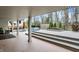 Spacious covered patio with access to the backyard deck and multiple seating areas at 8990 Pickwick Dr, Indianapolis, IN 46260