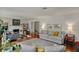 Inviting living room with hardwood floors, fireplace, and comfortable seating arrangement at 8990 Pickwick Dr, Indianapolis, IN 46260