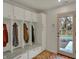 Functional mudroom features built-in storage, bench seating, and convenient access to the front door at 8990 Pickwick Dr, Indianapolis, IN 46260