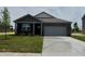 Charming single-Gathering home featuring a brick facade, attached garage, and freshly laid lawn at 915 Saddlebrook Farms Blvd, Whiteland, IN 46184