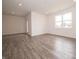 Open living room with laminate flooring and recessed lighting at 915 Saddlebrook Farms Blvd, Whiteland, IN 46184