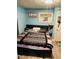Bedroom with queen bed, featuring natural lighting and comfortable space at 918 N Olney St, Indianapolis, IN 46201