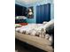 The main bedroom has curtains and a tv at 918 N Olney St, Indianapolis, IN 46201