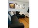 Inviting living room with a plush sofa, decorative pillows, and a bright window at 918 N Olney St, Indianapolis, IN 46201