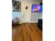 Comfortable living room, showcasing wood floors, furniture, and a mounted television at 918 N Olney St, Indianapolis, IN 46201