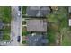 Aerial view of a home in a neighborhood with mature trees and street parking at 926 N Dearborn St, Indianapolis, IN 46201