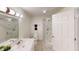 Clean bathroom featuring a glass door shower and modern fixtures at 926 N Dearborn St, Indianapolis, IN 46201