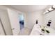 Modern bathroom with double sinks, and a view of the bedroom at 926 N Dearborn St, Indianapolis, IN 46201