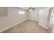 Bedroom featuring a ceiling fan and neutral carpet at 926 N Dearborn St, Indianapolis, IN 46201