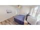 Comfortable bedroom with natural light, updated flooring and neutral paint at 926 N Dearborn St, Indianapolis, IN 46201