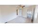 This cozy bedroom boasts neutral carpeting, and a ceiling fan, creating a serene and comfortable atmosphere at 926 N Dearborn St, Indianapolis, IN 46201