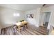 Dining room features modern furnishings, hardwood floors, and ample natural light at 926 N Dearborn St, Indianapolis, IN 46201