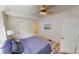 Bedroom includes a ceiling fan and closet space at 926 N Dearborn St, Indianapolis, IN 46201