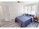 Bedroom with natural light, ceiling fan, and closet at 926 N Dearborn St, Indianapolis, IN 46201
