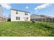 Well-maintained back yard features a green lawn, patio seating, and privacy fence, perfect for outdoor enjoyment at 951 Brookstone Dr, Franklin, IN 46131