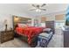 Comfortable bedroom featuring a ceiling fan, natural light, and ample space for relaxation at 951 Brookstone Dr, Franklin, IN 46131