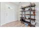 Inviting entryway featuring wood-look floors and stylish shelving for storage and decor at 951 Brookstone Dr, Franklin, IN 46131
