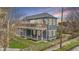 Charming two-story home with dual elevated decks and a beautifully landscaped yard at 953 Harrison St, Indianapolis, IN 46202