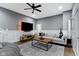 Comfortable living room featuring a plush gray sectional sofa and modern decor at 953 Harrison St, Indianapolis, IN 46202