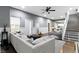 Spacious living area showcasing a sectional sofa, and hardwood floors at 953 Harrison St, Indianapolis, IN 46202