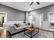Open-concept living room with comfortable sectional sofa and ample natural light at 953 Harrison St, Indianapolis, IN 46202