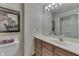 Neutral bathroom features framed mirror, and shower with clean white surround at 1021 Hudson Bay Dr, Greenwood, IN 46142